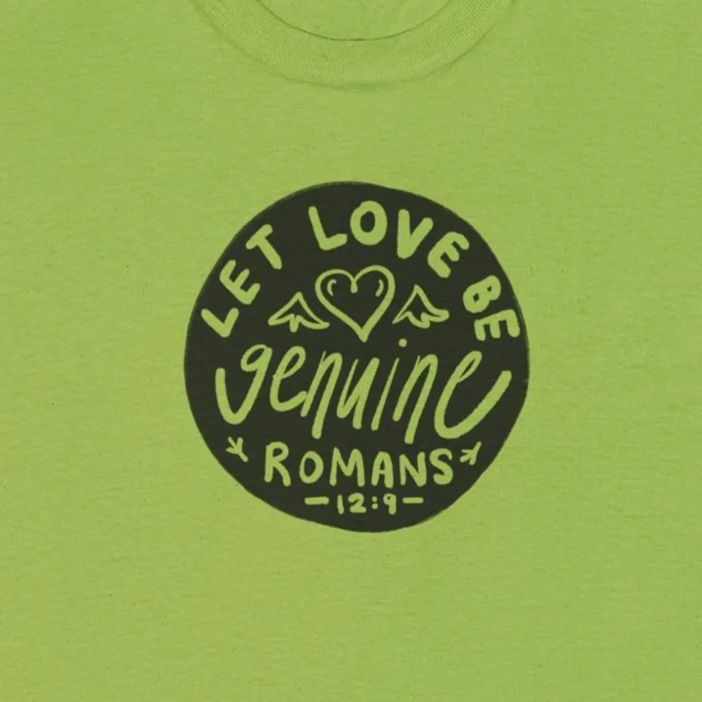 Circle seal with typography of Let Love be Genuine on green tshirt