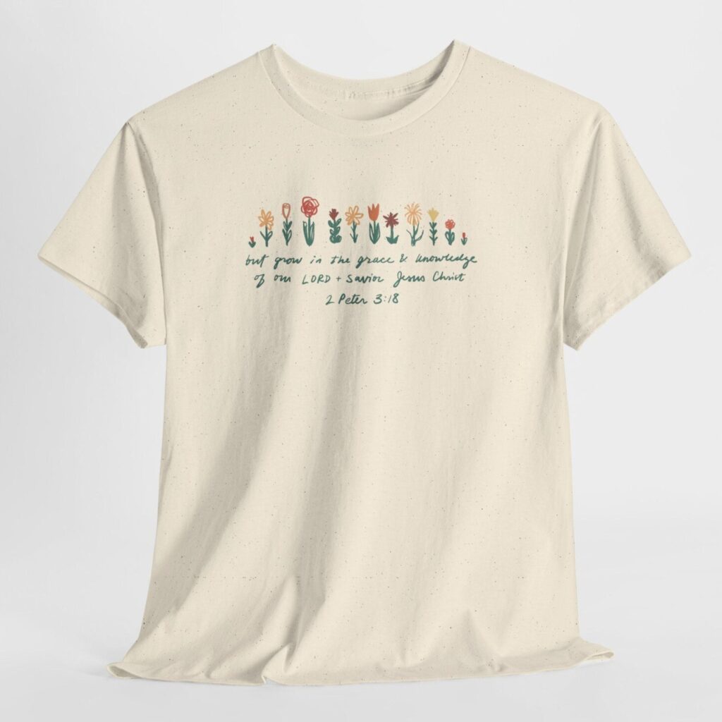 Off white shirt with flower drawings and handwritten verse graphic