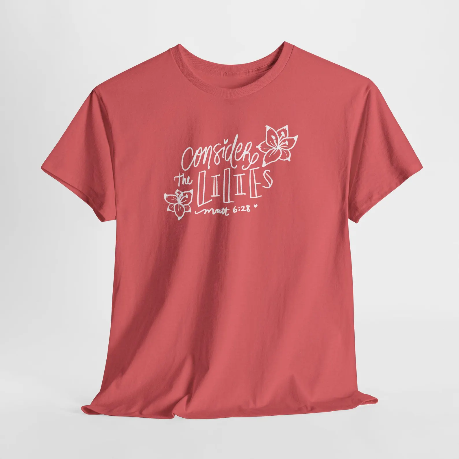 Handdrawn lily with typography verse graphic on pink shirt